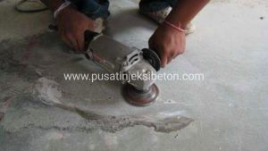 Proses finishingperbaikan beton retak