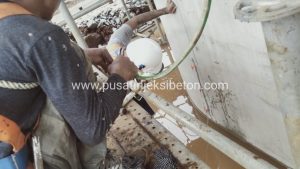 Proses perbaikan beton retak dengan injeksi epoxy